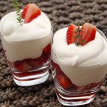 Strawberries with whipped cream and brandy