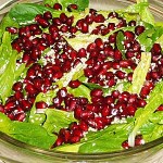 Salad with spinach, pomegranate