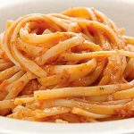 Spaghetti with tomato and almond pesto